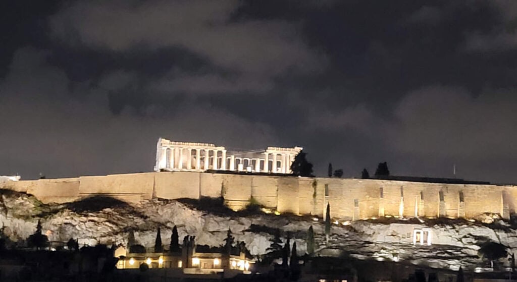 View of the Acropolis from the rooftop bar at the Acropolis Select Hotel in Athens, Greece.